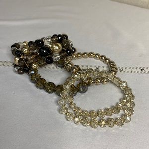 Group of five stretch neutral tone bracelets